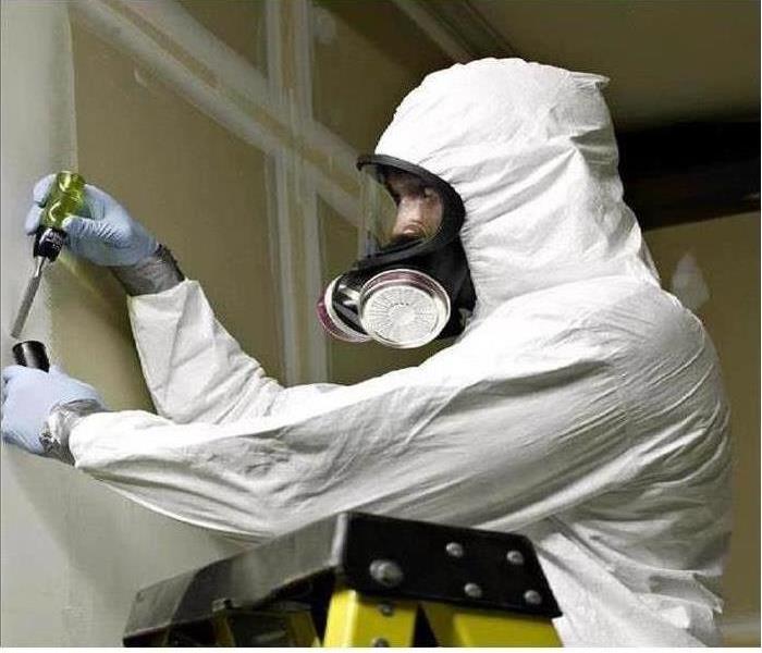 A SERVPRO staff doing Biohazard cleaning