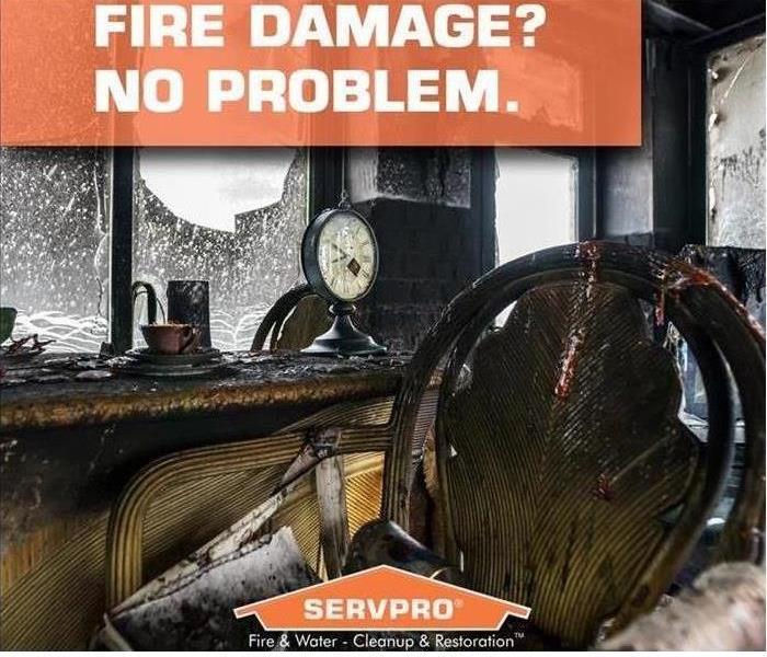 Servpro staff cleaning after fire damage
