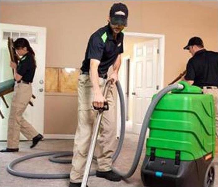 Servpro employees doing commercial floor cleaning